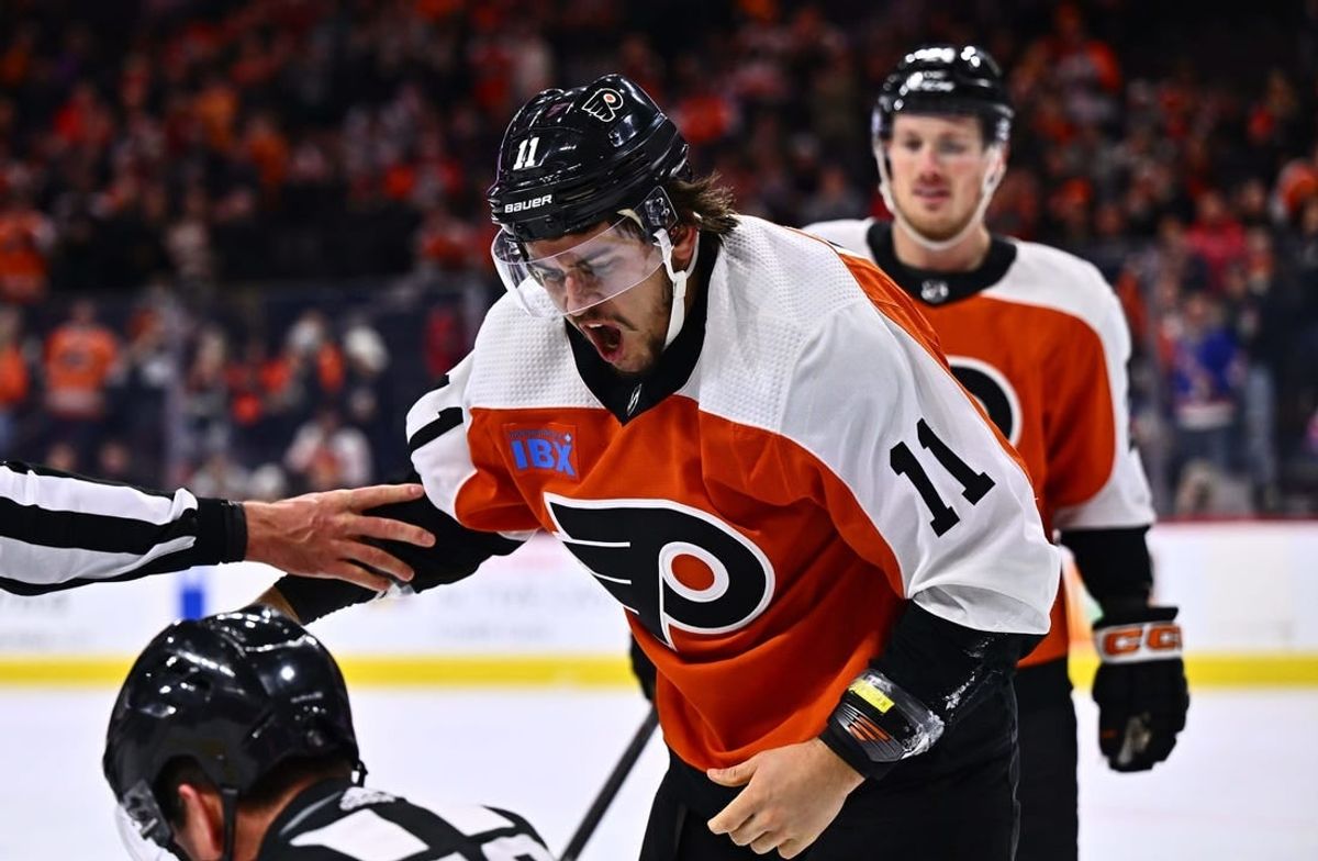 Feb 8, 2024; Philadelphia, Pennsylvania, USA; Philadelphia Flyers right wing Travis Konecny (11) reacts after a fight against Winnipeg Jets defenseman Neal Pionk (4) in the first period at Wells Fargo Center.