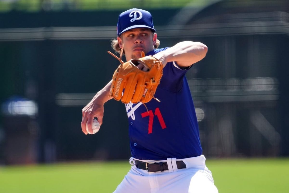 Mar 10, 2024; Phoenix, Arizona, USA; Los Angeles Dodgers starting pitcher Gavin Stone (71) pitches against the Arizona Diamondbacks during the first inning at Camelback Ranch-Glendale.