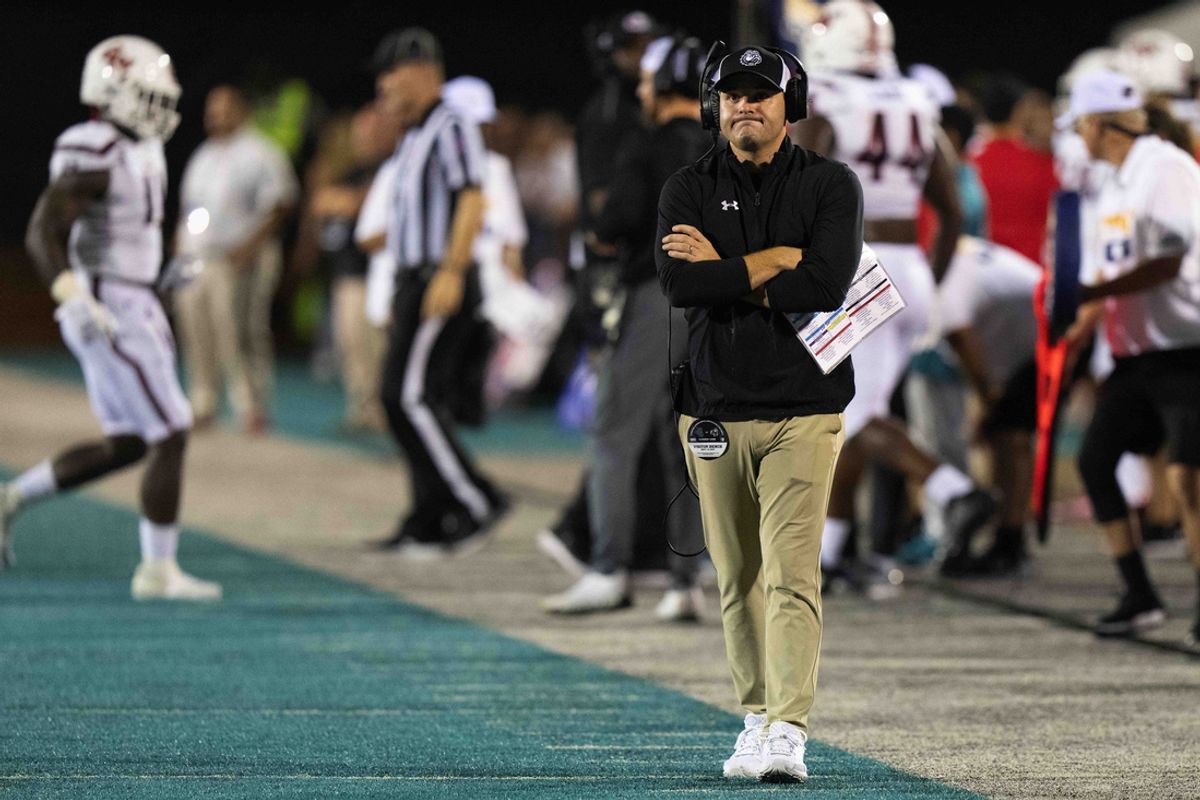 Sep 10, 2022; Conway, South Carolina, USA; Gardner-Webb Runnin Bulldogs head coach Tre Lamb walks the side lines in a game against the Coastal Carolina Chanticleers at Brooks Stadium. Mandatory Credit: David Yeazell-Imagn Images