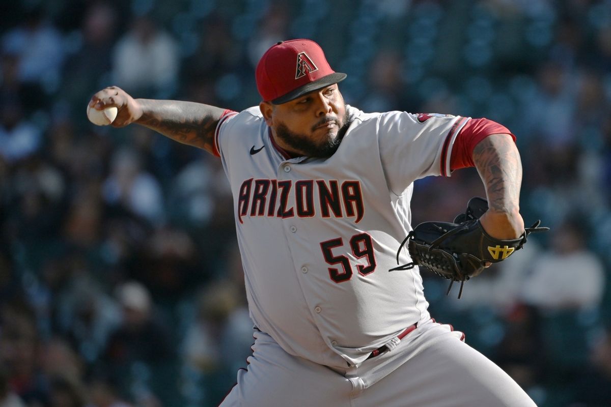 Oct 1, 2022; San Francisco, California, USA; Arizona Diamondbacks relief pitcher Reyes Moronta (59) throws against the San Francisco Giants during the ninth inning at Oracle Park. Mandatory Credit: Robert Edwards-USA TODAY Sports