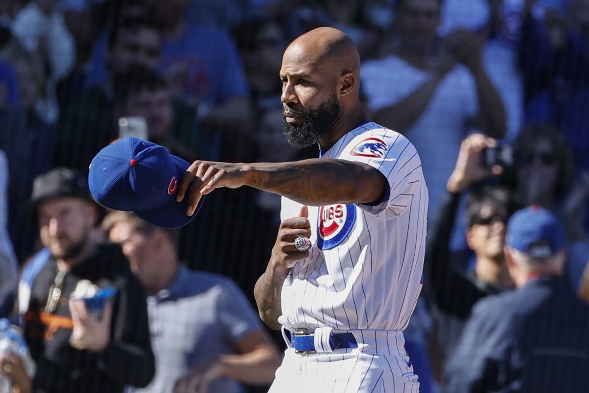 Oct 1, 2022; Chicago, Illinois, USA; Chicago Cubs Jason Heyward is being honored during a baseball game between the Chicago Cubs and Cincinnati Reds at Wrigley Field. Mandatory Credit: Kamil Krzaczynski-Imagn Images