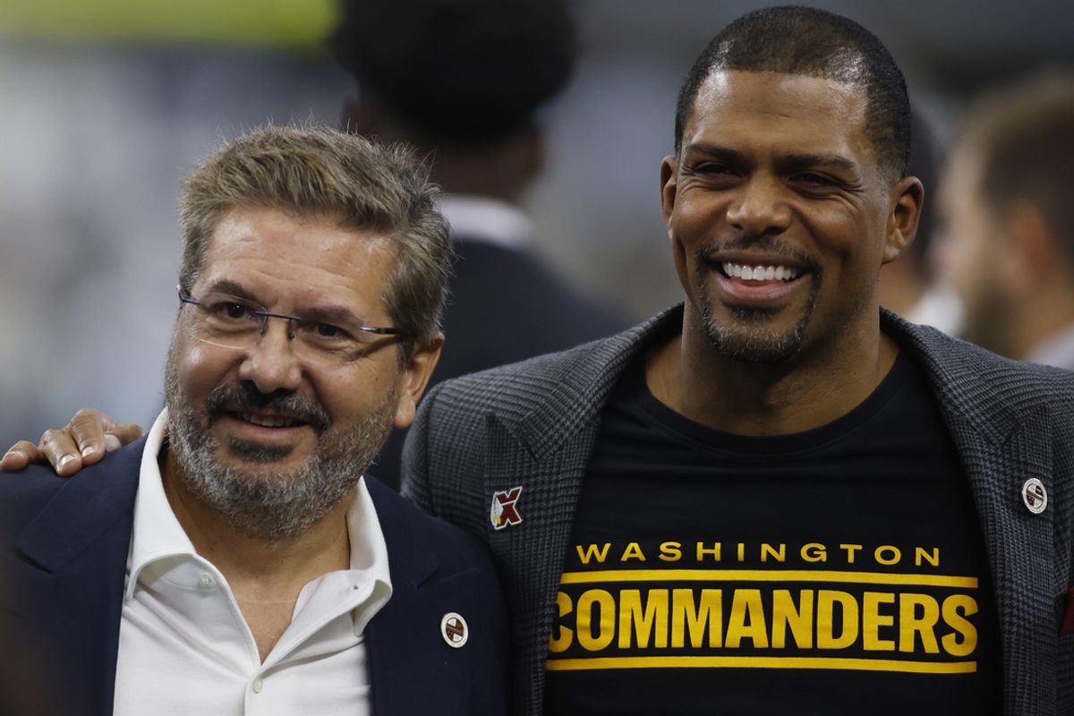 Oct 2, 2022; Arlington, Texas, USA; Washington Commanders owner Dan Snyder (L) and president Jason Wright  (R) pose for a photo before the game against the Dallas Cowboys at AT&T Stadium. Mandatory Credit: Tim Heitman-Imagn Images