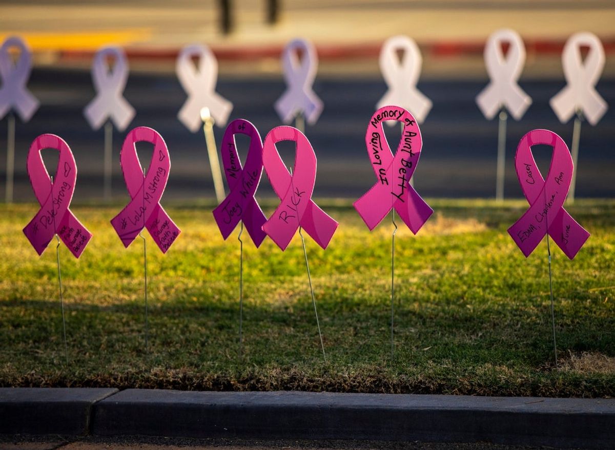 Pink ribbons with names of breast cancer survivors and those lost to the disease alike are seen during Paint El Paseo Pink in Palm Desert, Calif., Saturday, Oct. 8, 2022.