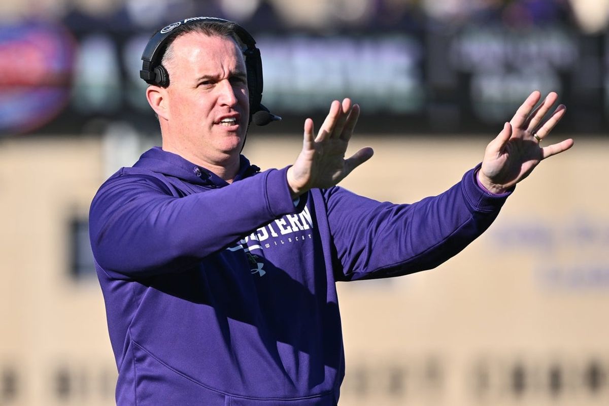 Oct 8, 2022; Evanston, Illinois, USA;  Northwestern Wildcats head coach Pat Fitzgerald gestures to the referees in the first half against the Wisconsin Badgers at Ryan Field. Wisconsin defeated Northwestern 42-7. Mandatory Credit: Jamie Sabau-Imagn Images