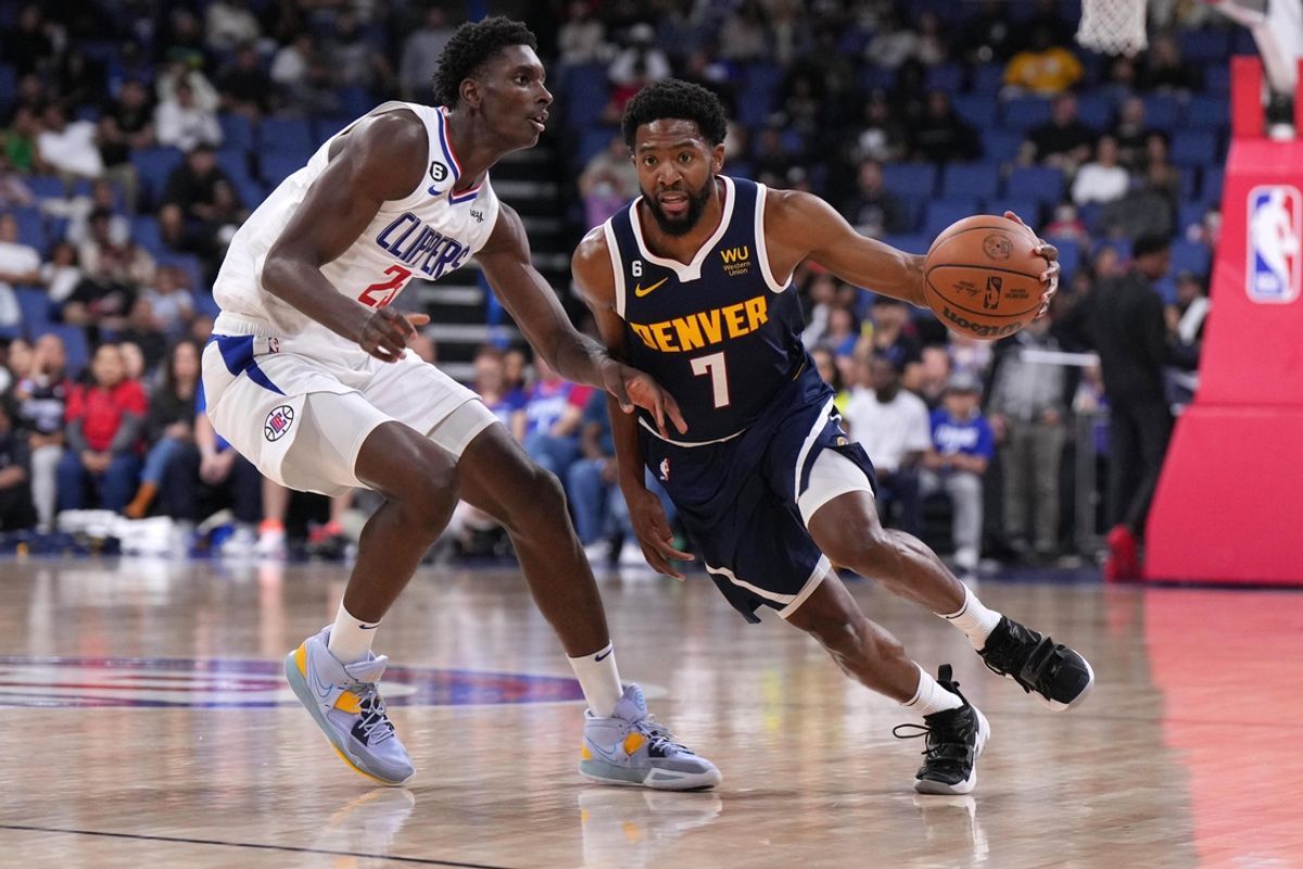 Oct 12, 2022; Ontario, California, USA; Denver Nuggets guard Chasson Randle (7) dribbles the ball against LA Clippers forward Moussa Diabate (25) in the second half at Toyota Arena. Mandatory Credit: Kirby Lee-Imagn Images