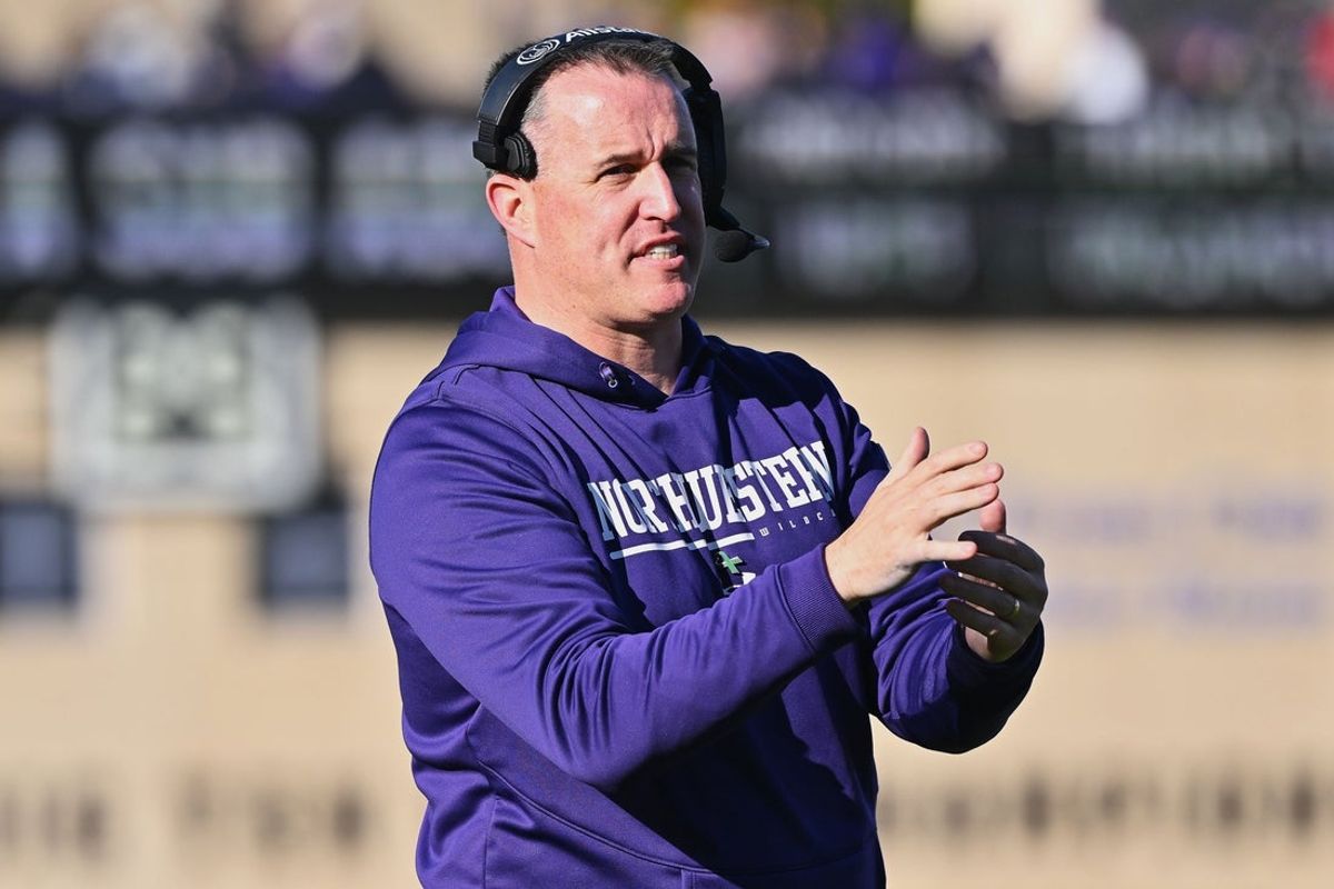 Oct 8, 2022; Evanston, Illinois, USA;  Northwestern Wildcats head coach Pat Fitzgerald watches his team play against the Wisconsin Badgers at Ryan Field. Mandatory Credit: Jamie Sabau-Imagn Images