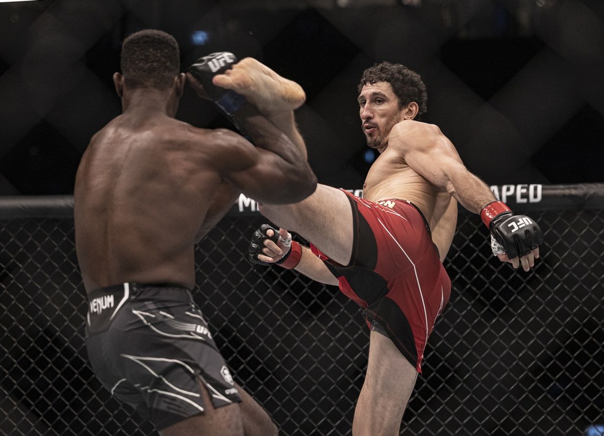 Oct 22, 2022; Abu Dhabi, UAE;  Armen Petrosyan (red gloves) and A.J. Dobson (blue gloves) during UFC 280 at Etihad Arena. Mandatory Credit: Craig Kidwell-USA TODAY Sports