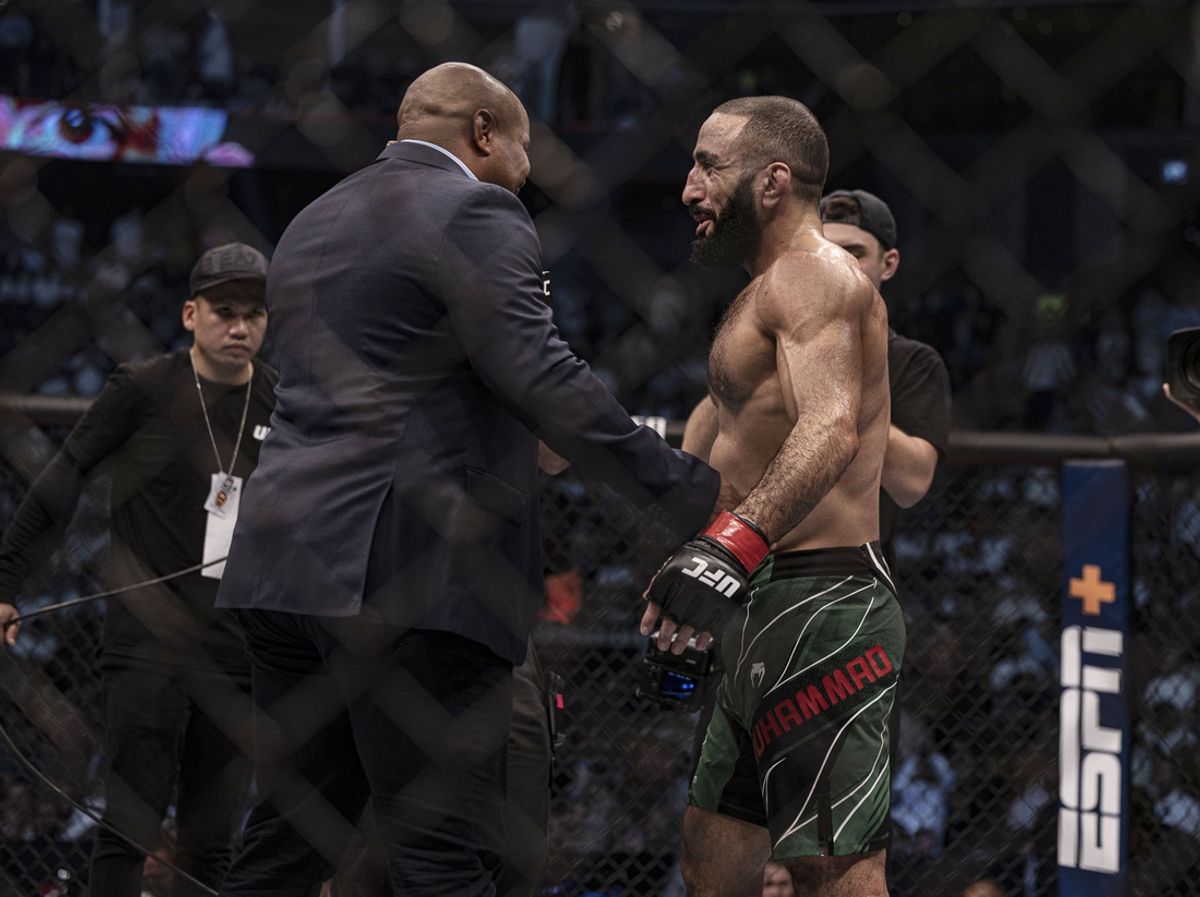 Oct 22, 2022; Abu Dhabi, UAE; Belal Muhammad (red gloves) defeats Sean Brady (blue gloves) during UFC 280 at Etihad Arena. Mandatory Credit: Craig Kidwell-USA TODAY Sports