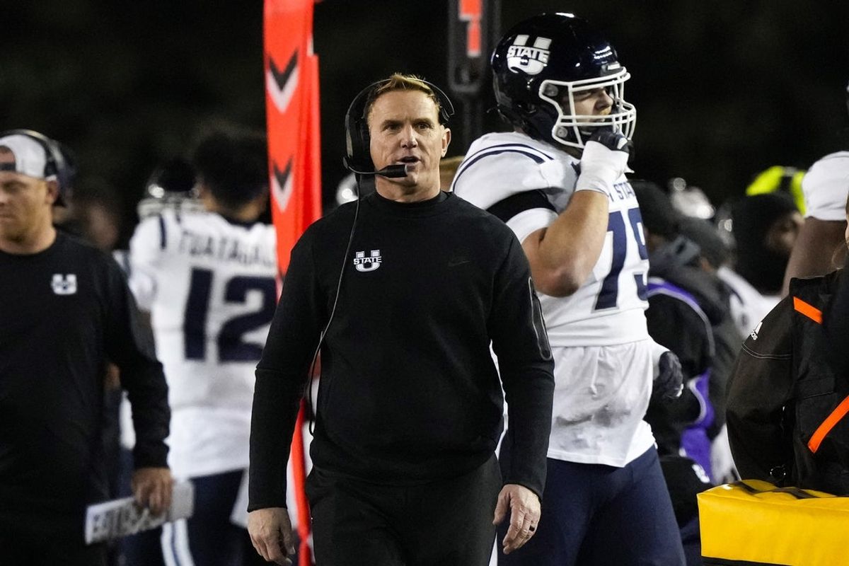 Oct 22, 2022; Laramie, Wyoming, USA; Utah State Aggies head coach Blake Anderson reacts during the first quarter against the Wyoming Cowboys at Jonah Field at War Memorial Stadium. Mandatory Credit: Troy Babbitt-Imagn Images