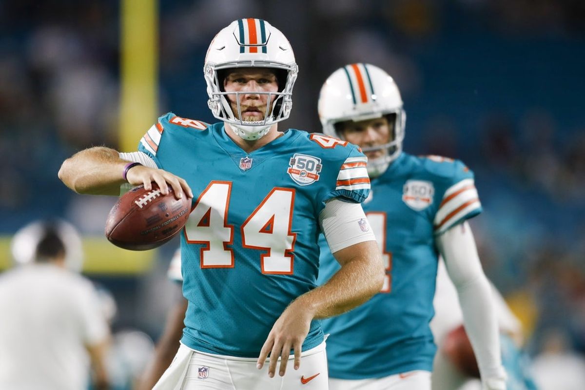 Oct 23, 2022; Miami Gardens, Florida, USA; Miami Dolphins long snapper Blake Ferguson (44) walks on the field prior to the game against the Pittsburgh Steelers at Hard Rock Stadium. Mandatory Credit: Sam Navarro-Imagn Images