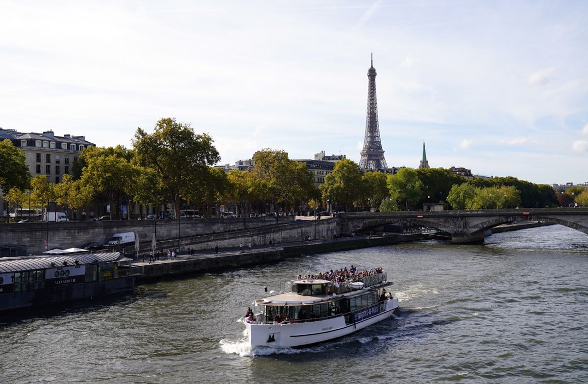 Oct 22, 2022; Paris, FRANCE;  General view the Eiffel Tower and the Seine river, as seen from Pont Alexandre III in advance of the Paris 2024 Summer Olympic Games. The bridge will serve as the site for triathlon, open water swim and road cycling. Mandatory Credit: Jerry Lai-USA TODAY Sports