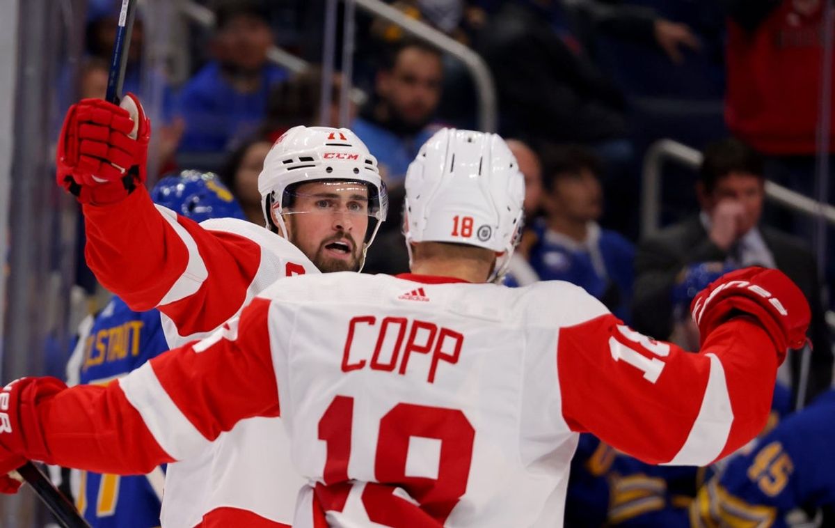 Oct 31, 2022; Buffalo, New York, USA; Detroit Red Wings center Dylan Larkin (71) celebrates his goal with center Andrew Copp (18) during the third period against the Buffalo Sabres at KeyBank Center. Mandatory Credit: Timothy T. Ludwig-Imagn Images