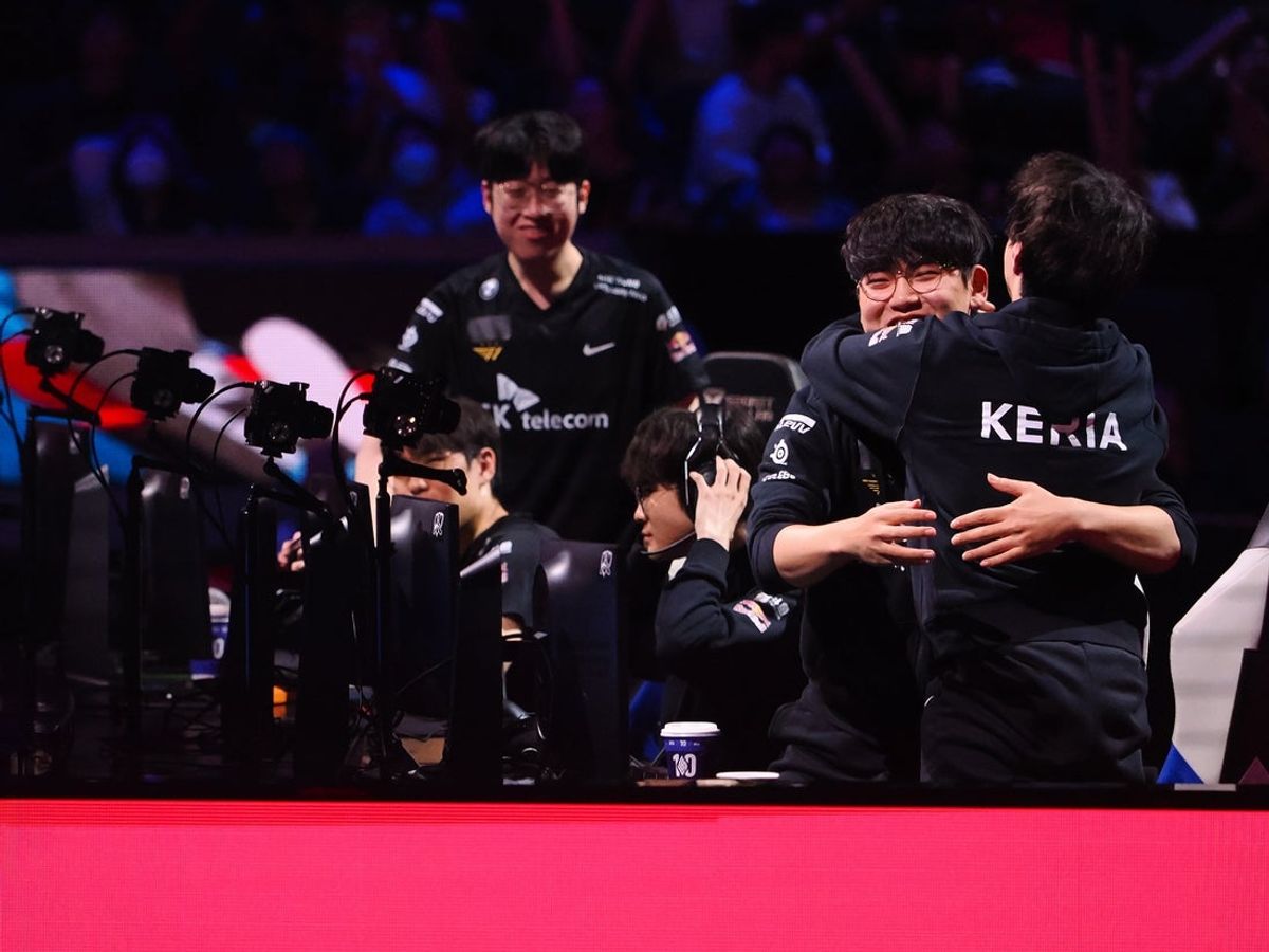 Nov 5, 2022; San Francisco, California, USA; T1 bot laner Min-hyeong "Gumayusi" Lee celebrates with T1 support Min-seok "Keria" Ryu after winning game 3 against DRX during the League of Legends World Championships at Chase Center. Mandatory Credit: Kelley L Cox-Imagn Images