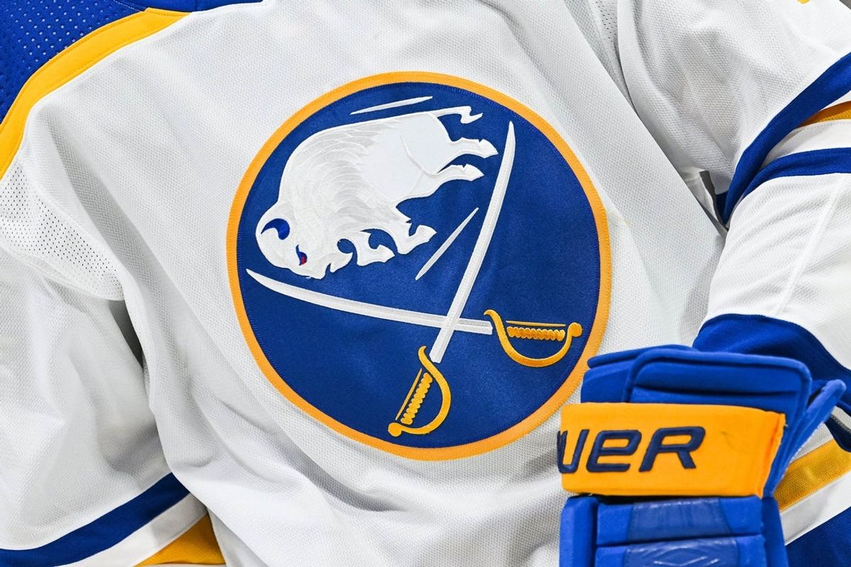 Nov 22, 2022; Montreal, Quebec, CAN; View of a Buffalo Sabres logo on a jersey worn by a member of the team during warm-up before the game against the Montreal Canadiens at Bell Centre. Mandatory Credit: David Kirouac-Imagn Images