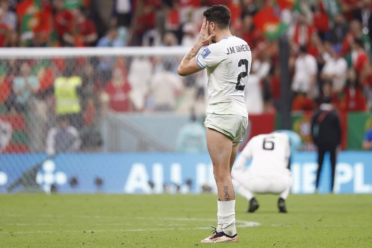 Nov 28, 2022; Lusail, Qatar; Uruguay defender Jose Gimenez (2) reacts following the loss against Portugal in the group stage match in the 2022 World Cup at Lusail Stadium. Mandatory Credit: Yukihito Taguchi-Imagn Images