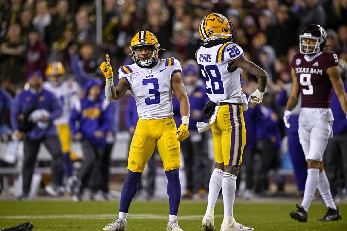 Nov 26, 2022; College Station, Texas, USA; LSU Tigers safety Greg Brooks Jr. (3) and safety Major Burns (28) in action during the game between the Texas A&M Aggies and the LSU Tigers at Kyle Field. Mandatory Credit: Jerome Miron-Imagn Images