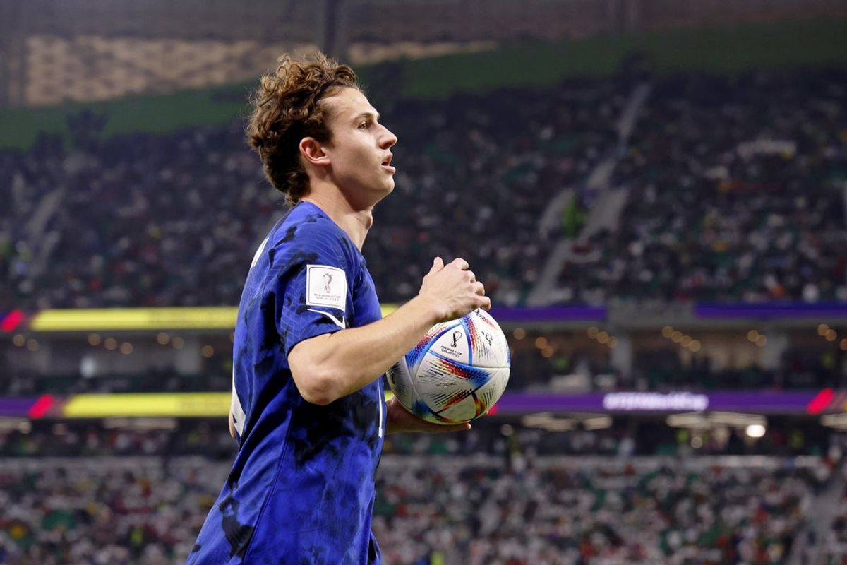 Nov 29, 2022; Doha, Qatar; United States of America midfielder Brenden Aaronson (11) prepares to throw the ball in against Iran during the second half of a group stage match during the 2022 World Cup at Al Thumama Stadium. Mandatory Credit: Yukihito Taguchi-Imagn Images