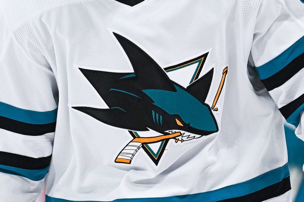 Nov 29, 2022; Montreal, Quebec, CAN; View of a San Jose Sharks logo on a jersey worn by a member of the team during the second period at Bell Centre. Mandatory Credit: David Kirouac-USA TODAY Sports