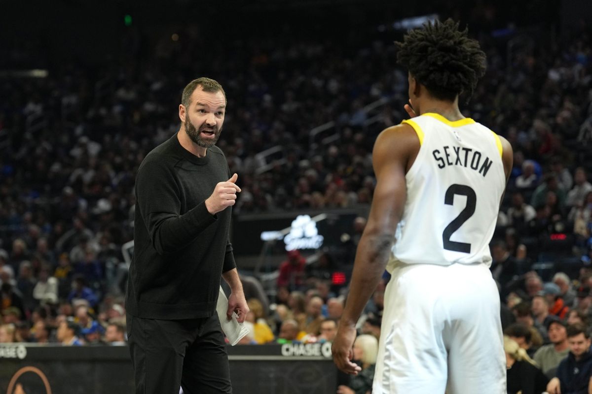 Nov 25, 2022; San Francisco, California, USA; Utah Jazz assistant coach Alex Jensen talks to guard Collin Sexton (2) during the second quarter against the Golden State Warriors at Chase Center. Mandatory Credit: Darren Yamashita-Imagn Images