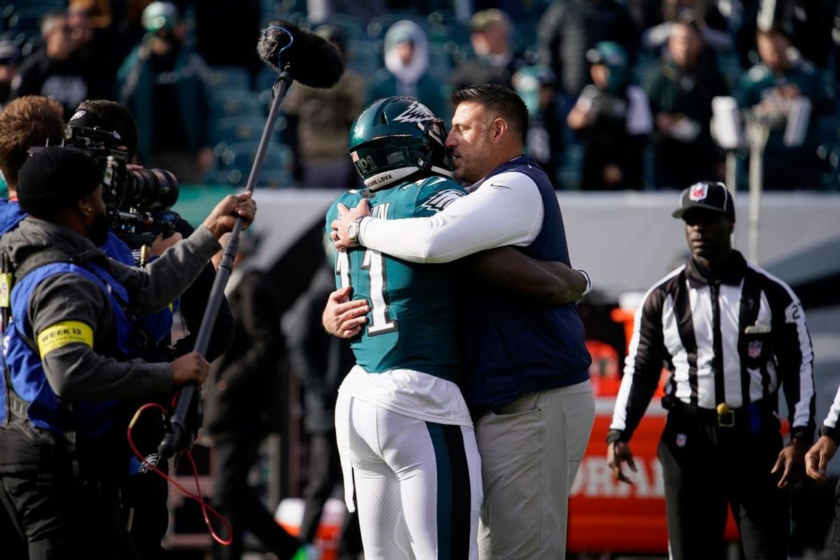 Tennessee Titans head coach Mike Vrabel hugs Philadelphia Eagles wide receiver A.J. Brown (11) as the teams get ready to face off at Lincoln Financial Field Sunday, Dec. 4, 2022, in Philadelphia, Pa.

Nfl Tennessee Titans At Philadelphia Eagles