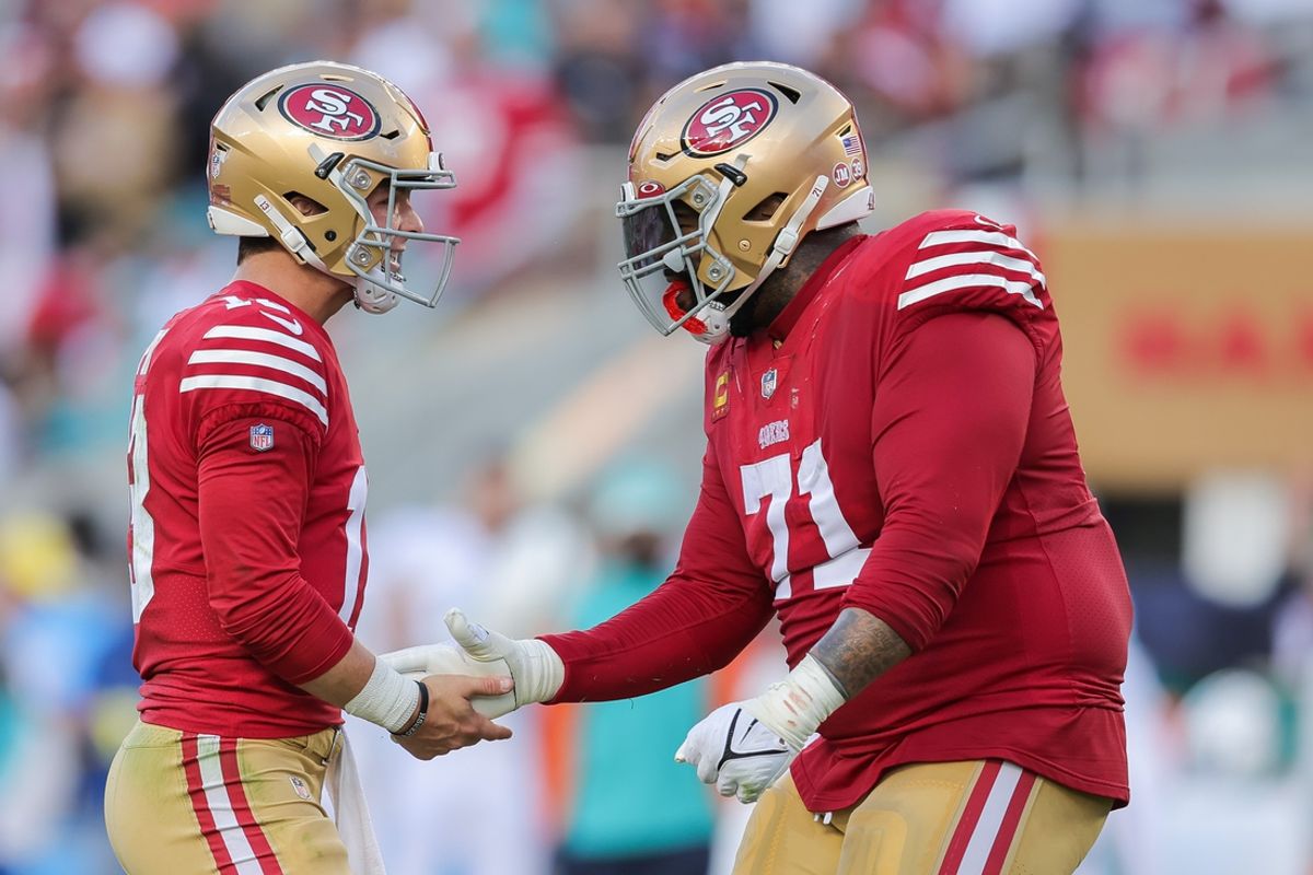 Dec 4, 2022; Santa Clara, California, USA; San Francisco 49ers quarterback Brock Purdy (13) celebrates with offensive tackle Trent Williams (71) after a touchdown during the second quarter at Levi's Stadium. Mandatory Credit: Sergio Estrada-USA TODAY Sports