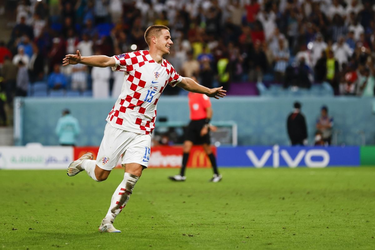 Dec 5, 2022; Al-Wakrah, Qatar; Croatia midfielder Mario Pasalic (15) celebrates his goal during a penalty kick shootout a round of sixteen match against Japan during the 2022 FIFA World Cup at Al-Janoub Stadium. Pasalic wont game for Croatia with his goal. Croatia defeated Japan, 3-1 on penalty kicks. Mandatory Credit: Yukihito Taguchi-Imagn Images