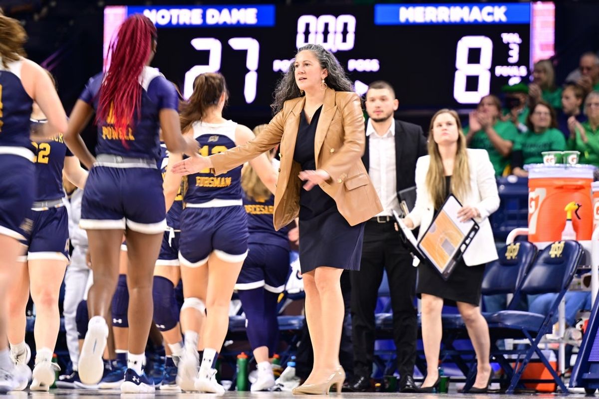 Dec 10, 2022; South Bend, Indiana, USA; Merrimack Warriors head coach Kelly Morrone at the end of the first quarter against the Notre Dame Fighting Irish at the Purcell Pavilion. Mandatory Credit: Matt Cashore-Imagn Images