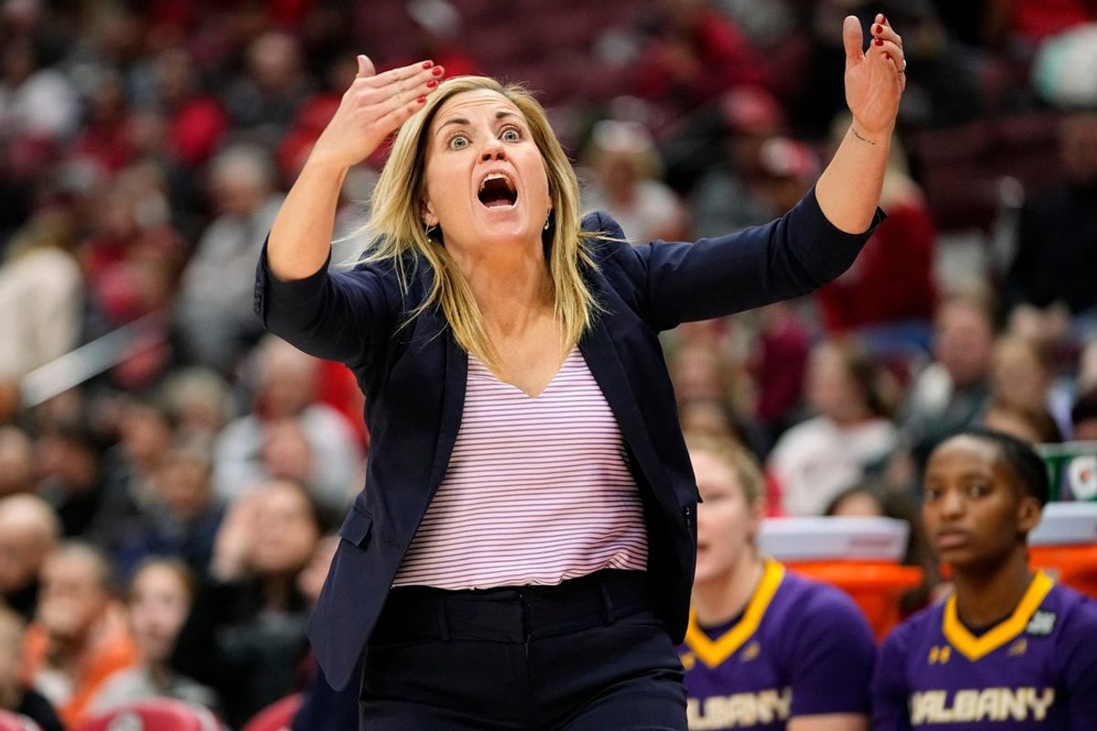 Dec 16, 2022; Columbus, OH, USA;  UAlbany Great Danes head coach Colleen Mullen tries to call timeout during the first half of the NCAA women's basketball game against the Ohio State Buckeyes at Value City Arena. Mandatory Credit: Adam Cairns-The Columbus Dispatch

Basketball Ualbany At Ohio State
