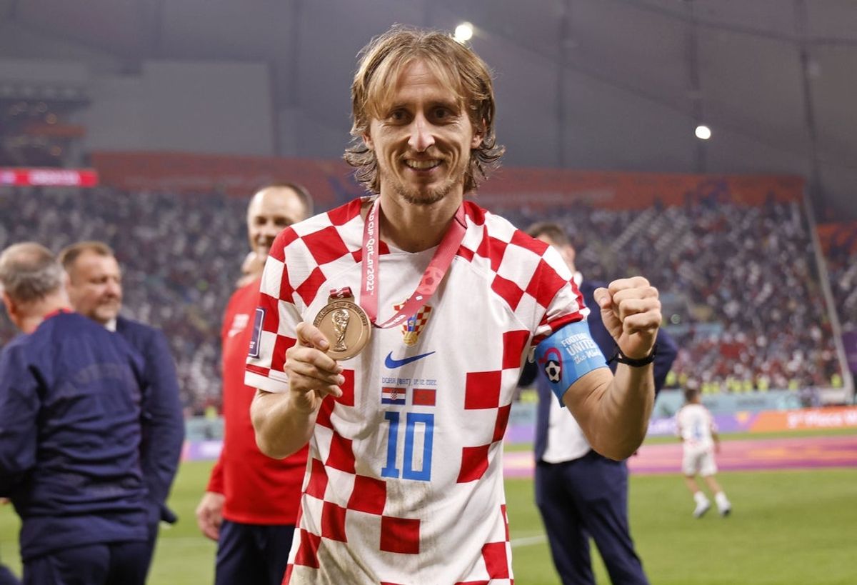 Dec 17, 2022; Doha, Qatar; Croatia midfielder Luka Modric (10) reacts after winning the third place match against Morocco during the 2022 World Cup at Khalifa International Stadium. Mandatory Credit: Yukihito Taguchi-Imagn Images
