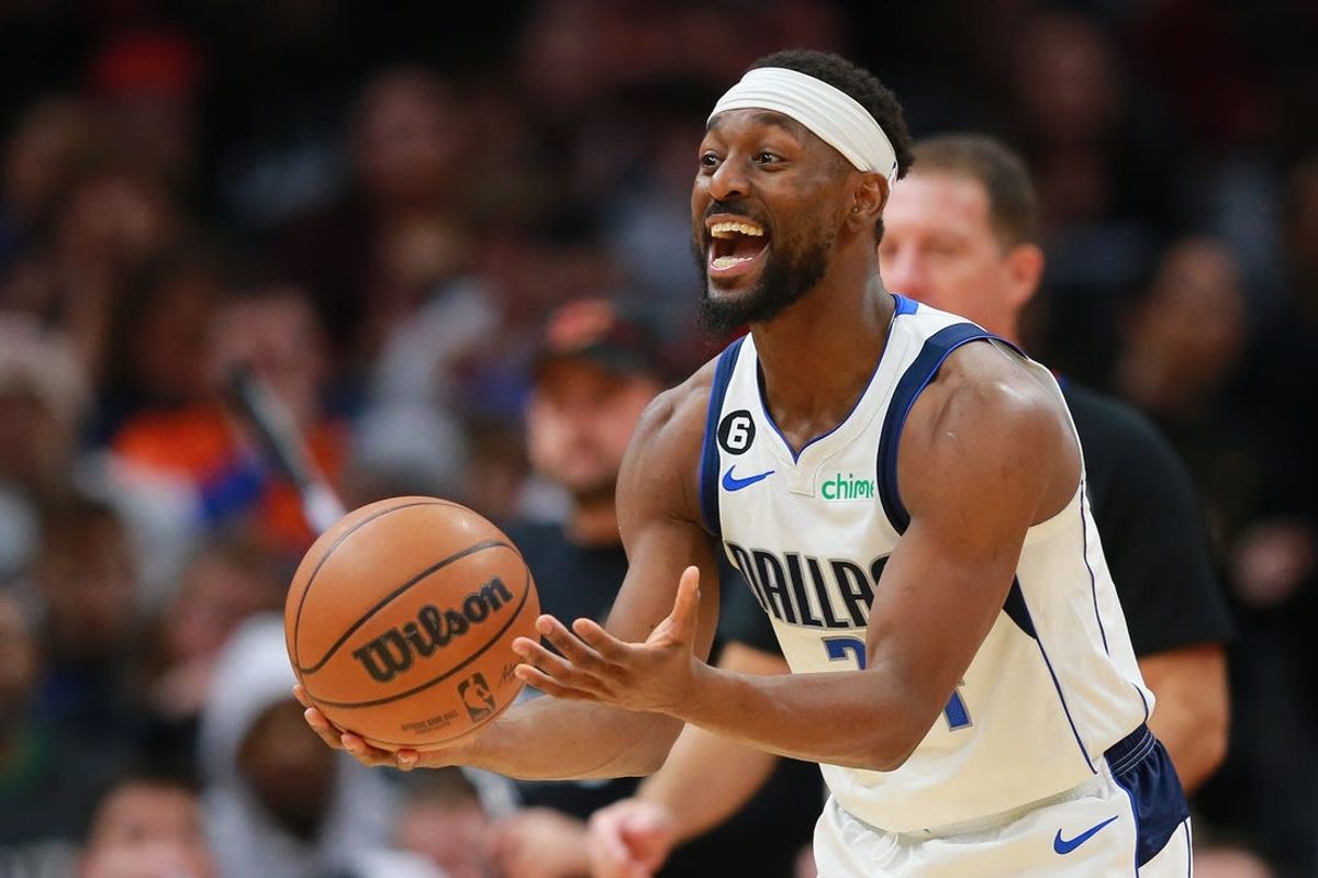 Dec 17, 2022; Cleveland, Ohio, USA; Dallas Mavericks guard Kemba Walker (34) reacts after a foul call during the second half against the Cleveland Cavaliers at Rocket Mortgage FieldHouse. Mandatory Credit: Aaron Josefczyk-USA TODAY Sports