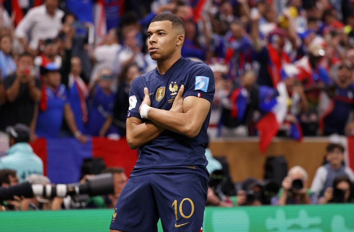Dec 18, 2022; Lusail, Qatar; France forward Kylian Mbappe (10) celebrates after scoring a goal against Argentina on a penalty kick for his third goal of the match during extra time of the 2022 World Cup final at Lusail Stadium. Mandatory Credit: Yukihito Taguchi-Imagn Images