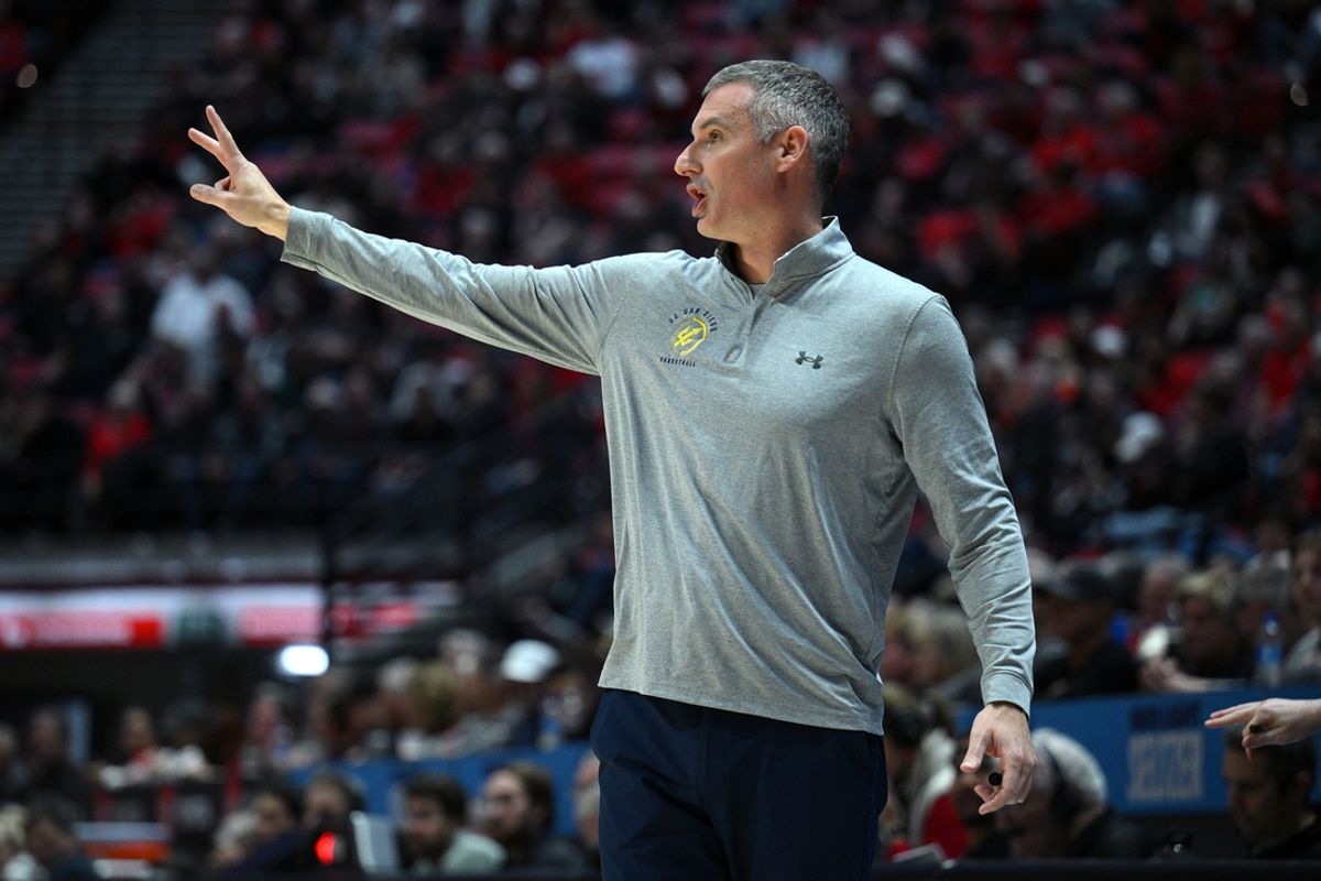 Dec 20, 2022; San Diego, California, USA; UC San Diego Tritons head coach Eric Olen gestures during the first half against the San Diego State Aztecs at Viejas Arena. Mandatory Credit: Orlando Ramirez-Imagn Images