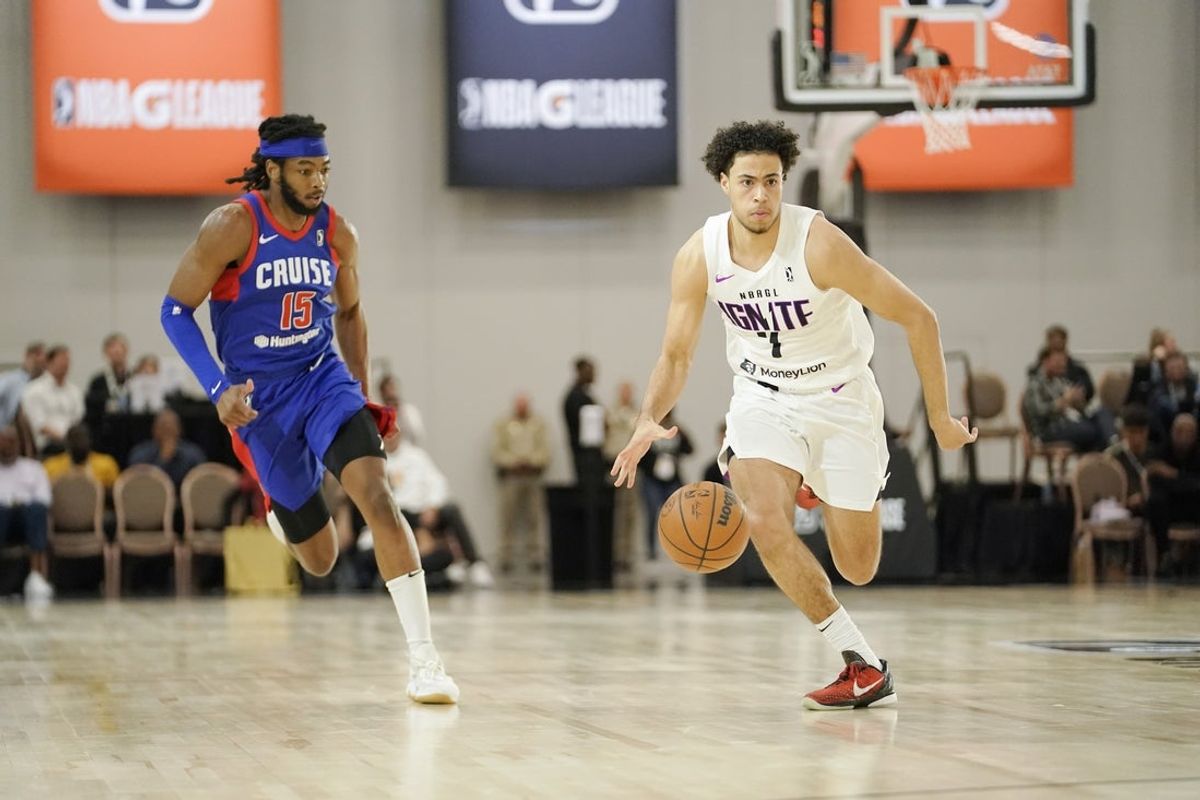 Dec 20, 2022; Las Vegas, NV, USA; NBA G League Ignite guard Mojave King (7) dribbles the ball against Motor City Cruise guard Trayvon Palmer (15) during the second half at Mandalay Bay Convention Center.  Mandatory Credit: Lucas Peltier-Imagn Images