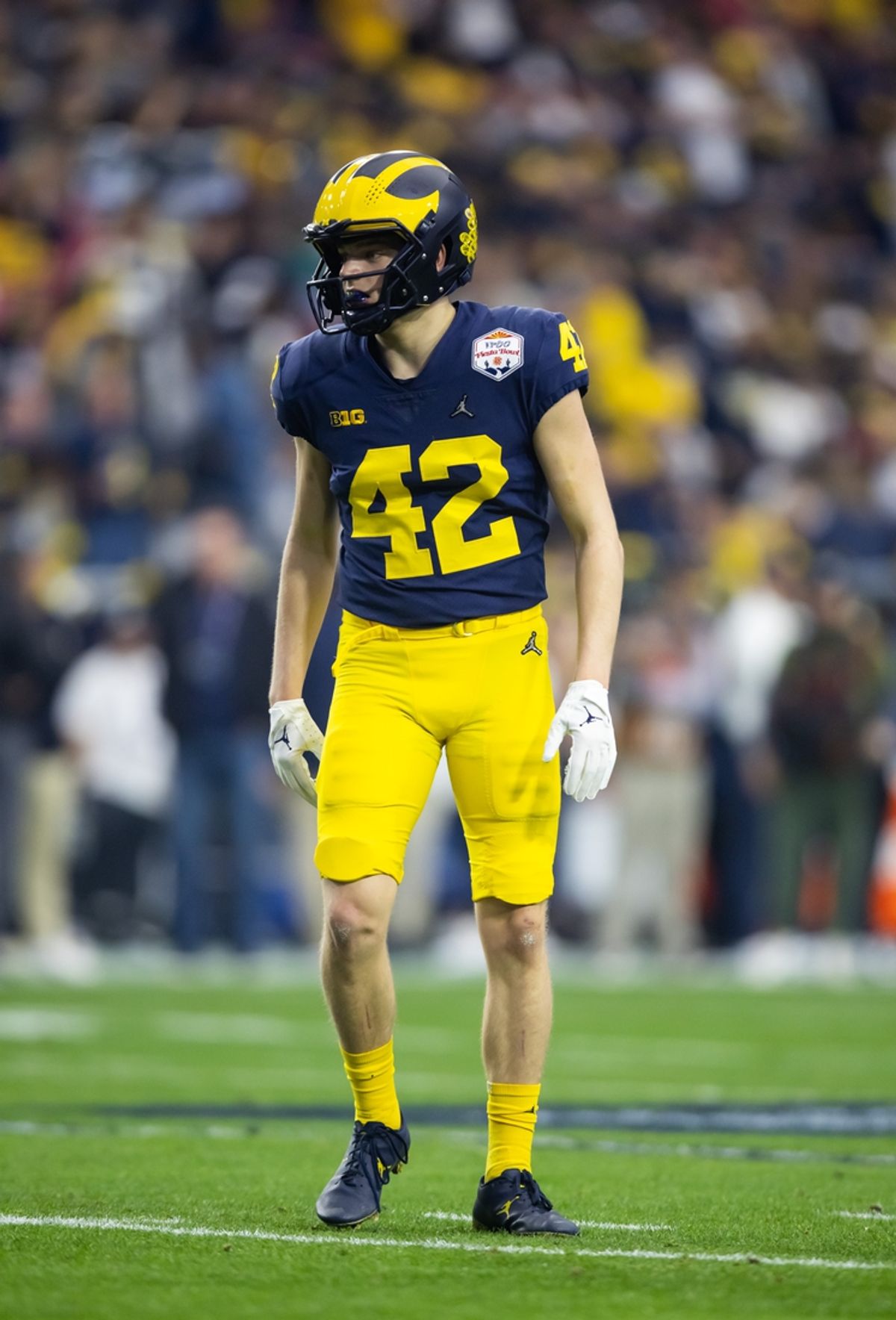 Dec 31, 2022; Glendale, Arizona, USA; Michigan Wolverines defensive back Jesse Madden (42) against the TCU Horned Frogs during the 2022 Fiesta Bowl at State Farm Stadium. Mandatory Credit: Mark J. Rebilas-Imagn Images
