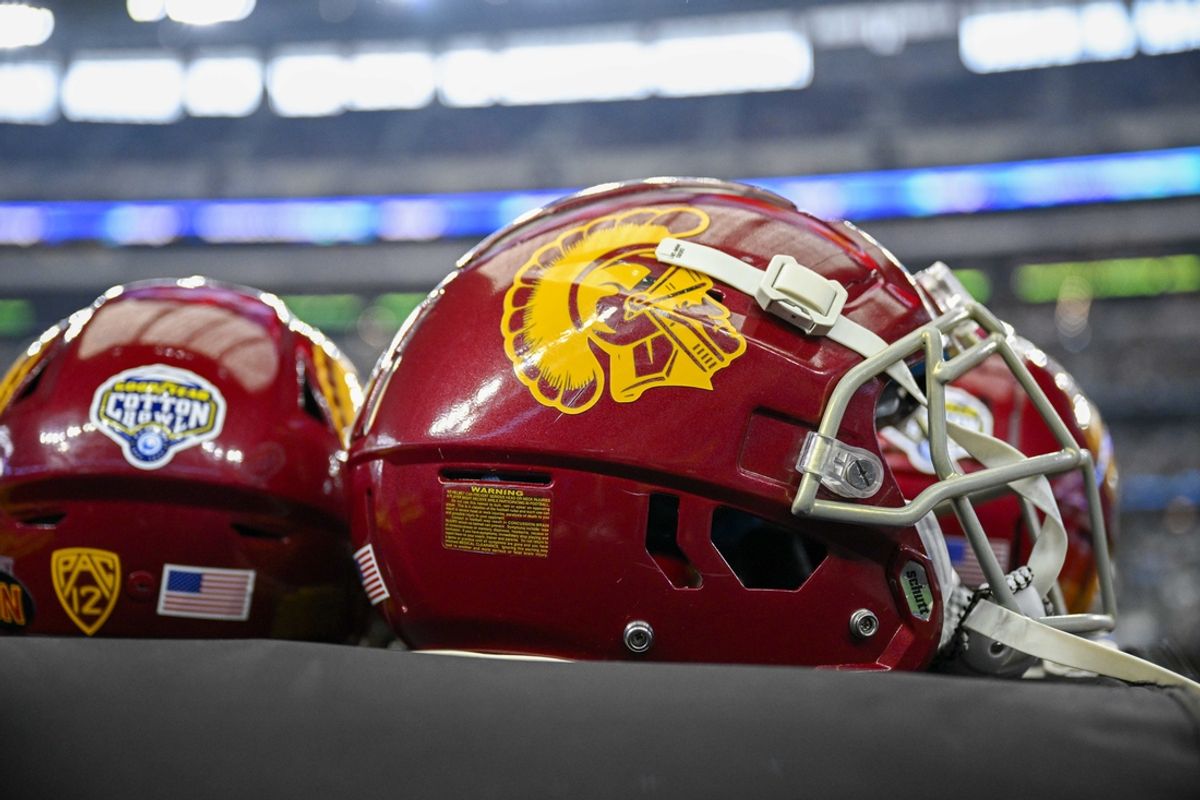 Jan 2, 2023; Arlington, Texas, USA; A view of the USC Trojans helmets and Cotton Bowl logo during the game between the USC Trojans and the Tulane Green Wave in the 2023 Cotton Bowl at AT&T Stadium. Mandatory Credit: Jerome Miron-Imagn Images