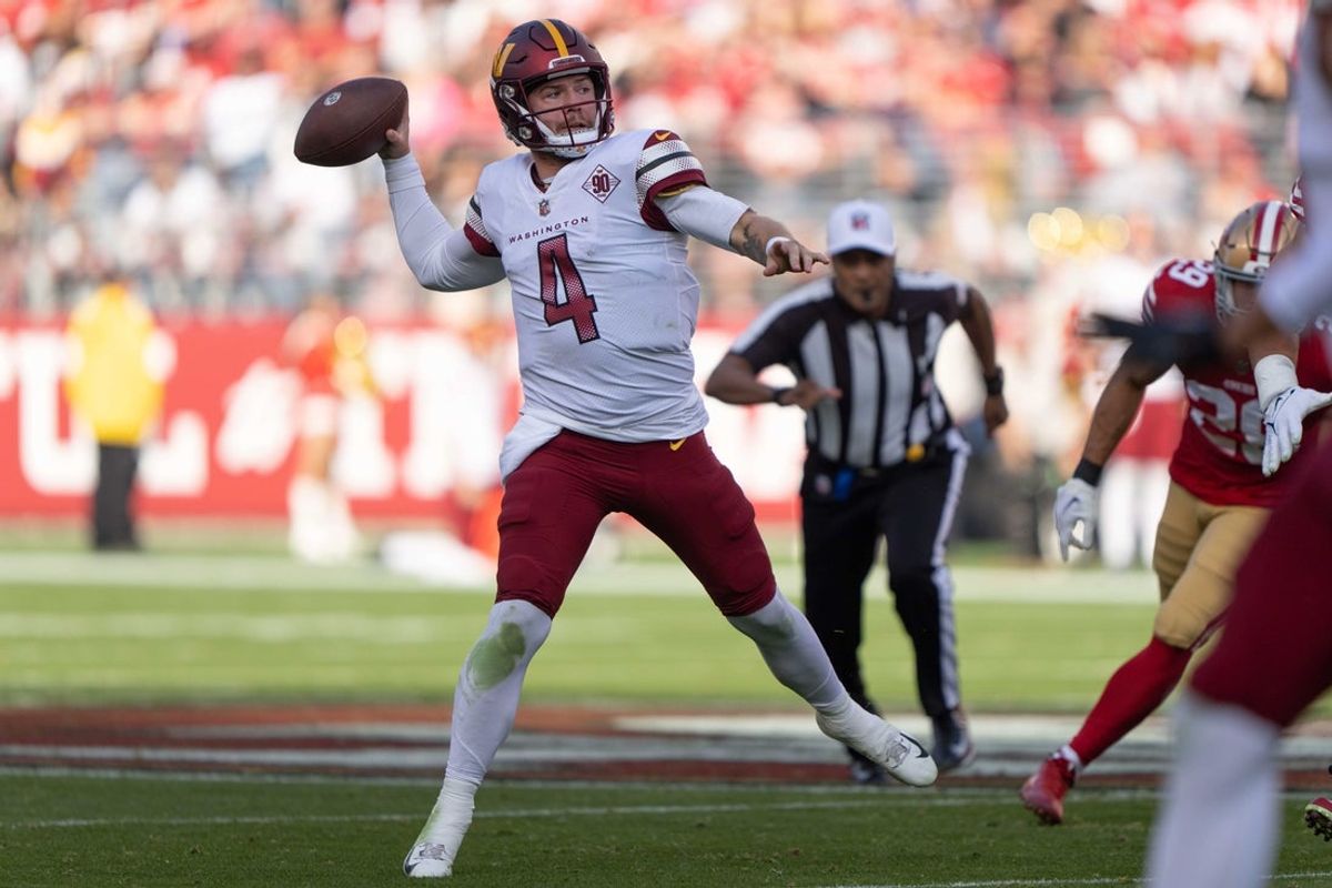 Dec 24, 2022; Santa Clara, California, USA;  Washington Commanders quarterback Taylor Heinicke (4) throws the football during the second quarter against the San Francisco 49ers at Levi's Stadium. Mandatory Credit: Stan Szeto-Imagn Images