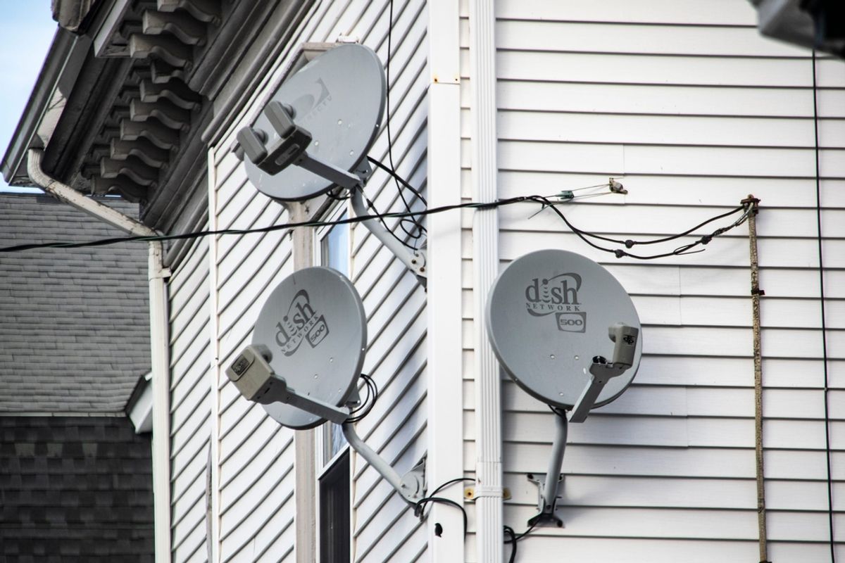 Three satellite dishes are positioned on the side of a house in Providence.

Satellite Dishes In Providence 1