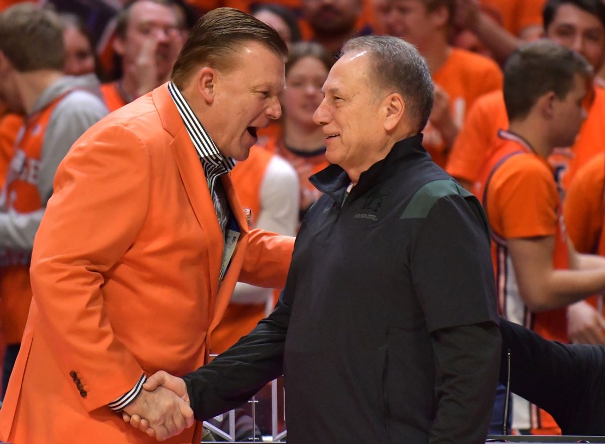 Jan 13, 2023; Champaign, Illinois, USA;  Illinois Fighting Illini head coach Brad Underwood, left, shakes hands with Michigan State Spartans head coach Tom Izzo before the first half at State Farm Center. Mandatory Credit: Ron Johnson-Imagn Images