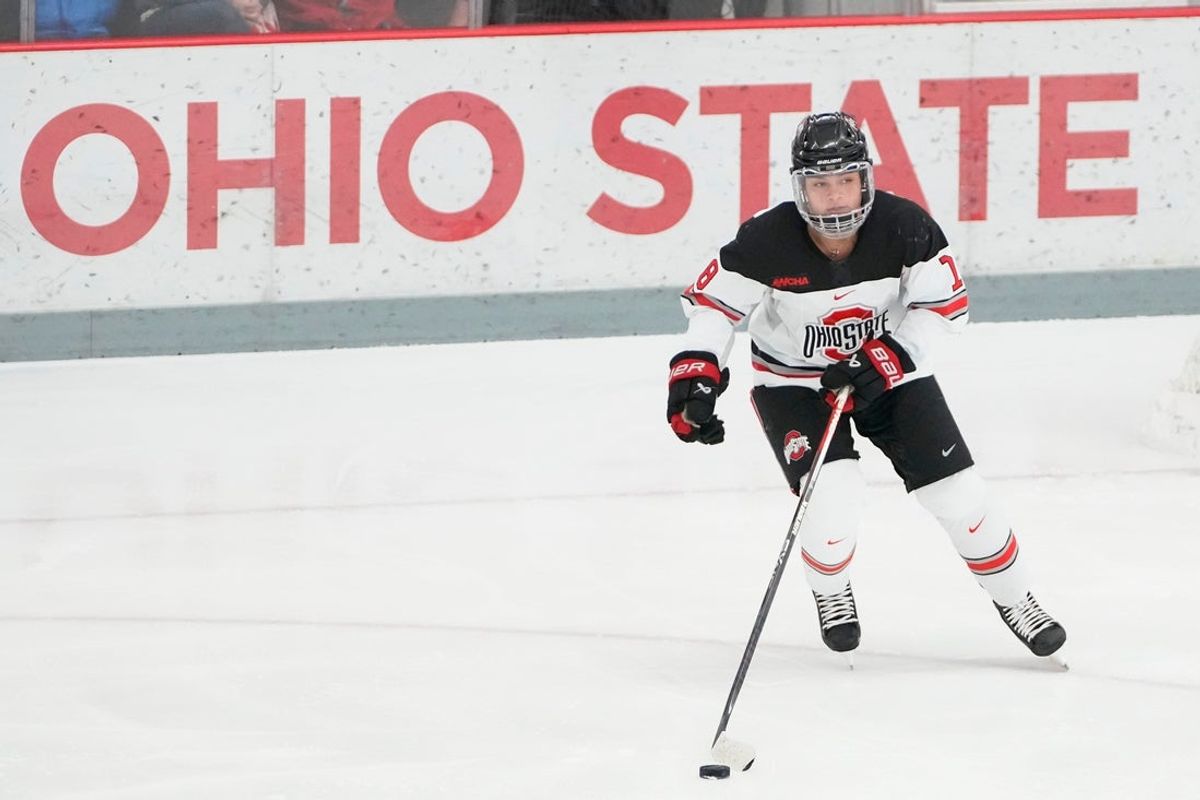 Jan 13, 2023; Columbus, Ohio, USA;  Ohio State Buckeyes defenseman Sophie Jaques (18) carries the puck during the NCAA women's hockey game against the Wisconsin Badgers at the OSU Ice Rink. Ohio State won 2-1 in overtime. Mandatory Credit: Adam Cairns-The Columbus Dispatch

Ncaa Hockey Ceb Osu Women S Hockey