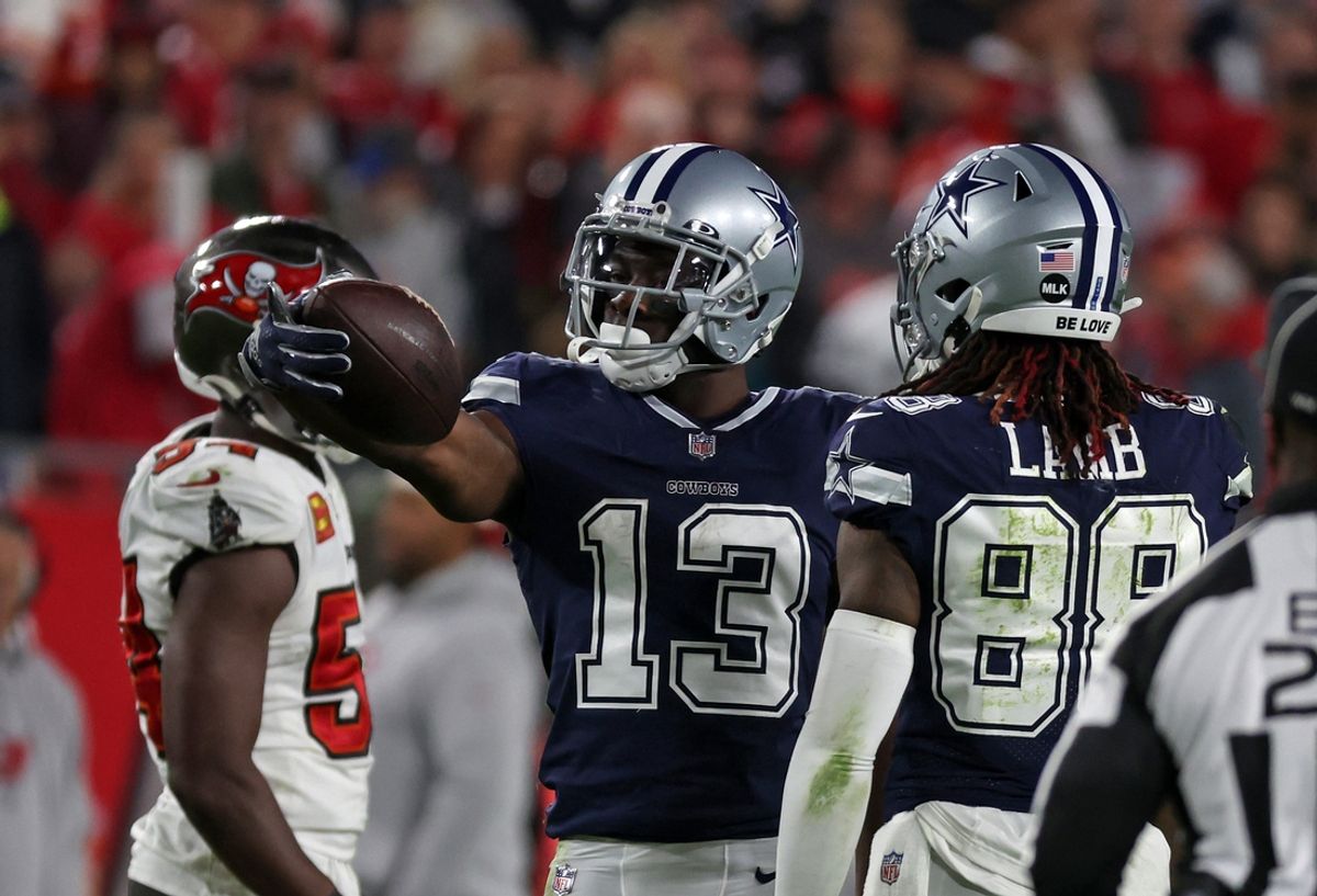 Jan 16, 2023; Tampa, Florida, USA; Dallas Cowboys wide receiver Michael Gallup (13) reacts after a catch against the Tampa Bay Buccaneers in the second half during the wild card game at Raymond James Stadium. Mandatory Credit: Kim Klement-Imagn Images