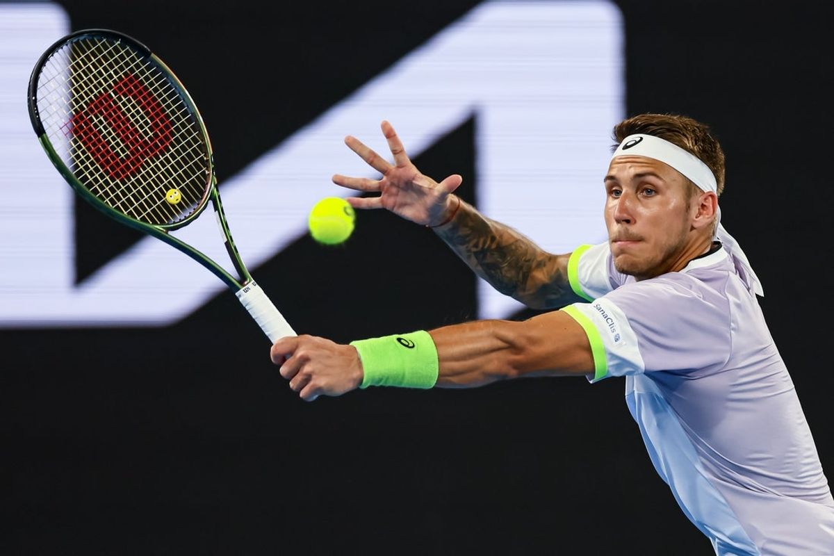 Jan 18, 2023; Melbourne, Victoria, Australia; Alex Molcan during his second round match against Felix Auger-Aliassime on day three of the 2023 Australian Open tennis tournament at Melbourne Park. Mandatory Credit: Mike Frey-Imagn Images