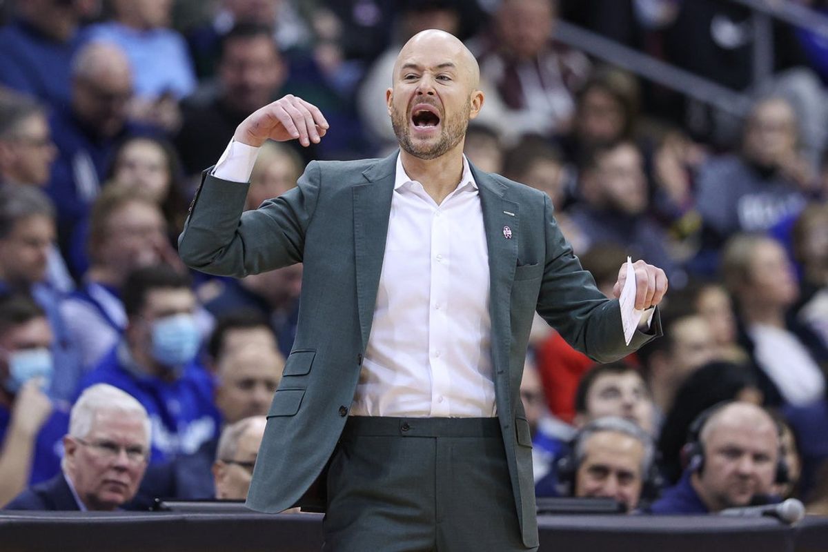 Jan 18, 2023; Newark, New Jersey, USA; Connecticut Huskies assistant coach Luke Murray reacts during the first half against the Seton Hall Pirates at Prudential Center. Mandatory Credit: Vincent Carchietta-Imagn Images