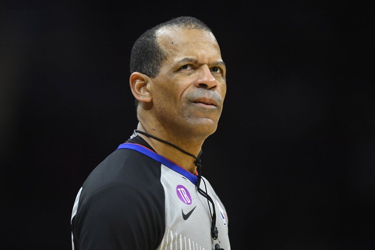 Feb 8, 2023; Cleveland, Ohio, USA; NBA referee Eric Lewis (42) stands on the court in the third quarter of a game between the Cleveland Cavaliers and the Detroit Pistons at Rocket Mortgage FieldHouse. Mandatory Credit: David Richard-Imagn Images