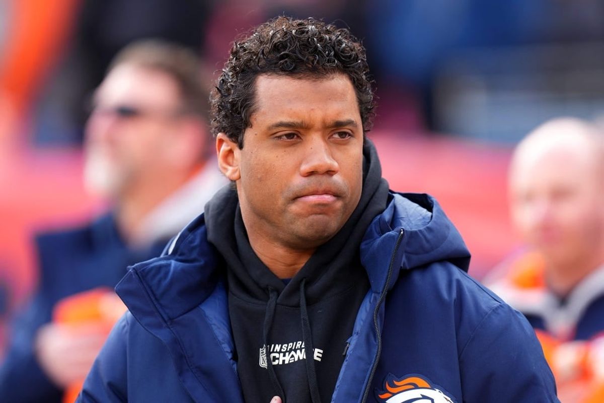 Dec 18, 2022; Denver, Colorado, USA; Denver Broncos quarterback Russell Wilson (3) on the sidelines before the start of the game against the Arizona Cardinals at Empower Field at Mile High.