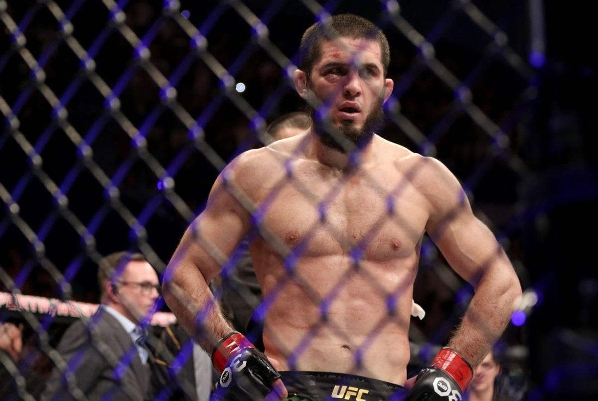Feb 12, 2023; Perth, WA, AUSTRALIA; Islam Makhachev (red gloves) during the fight against Alexander Volkanovski (not pictured) during UFC 284 at RAC Arena. Mandatory Credit: Jasmin Frank-USA TODAY Sports