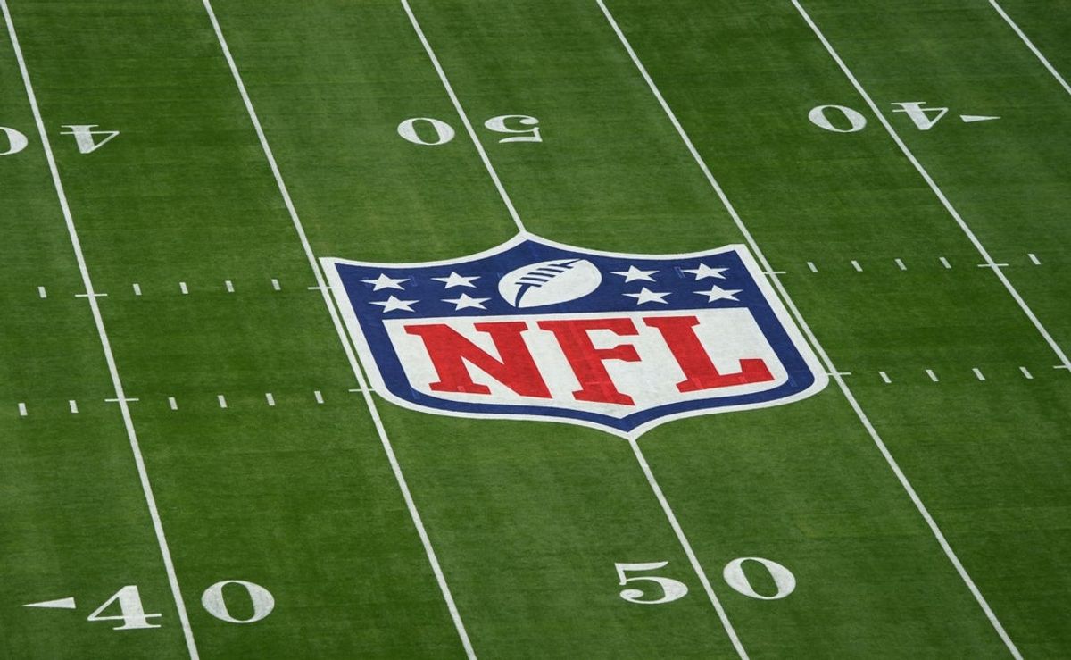 Feb 12, 2023; Glendale, AZ, USA; A general view of the NFL shield logo on the field before Super Bowl LVII between the Kansas City Chiefs and Philadelphia Eagles at State Farm Stadium. Mandatory Credit: Kirby Lee-Imagn Images