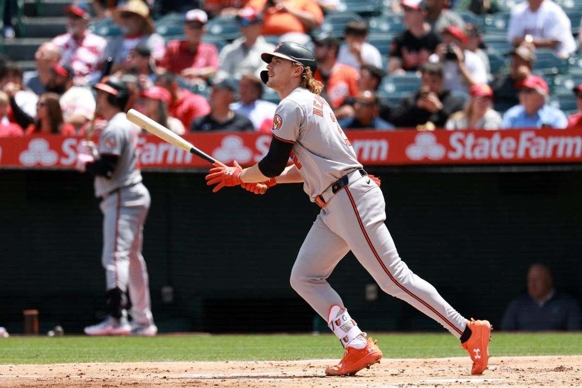 Apr 24, 2024; Anaheim, California, USA;  Baltimore Orioles shortstop Gunnar Henderson (2) hits a home run during the third inning against the Los Angeles Angels at Angel Stadium.