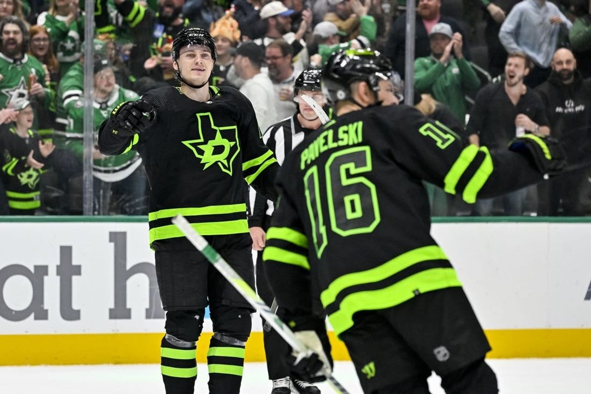 Nov 22, 2023; Dallas, Texas, USA; Dallas Stars center Roope Hintz (24) and center Joe Pavelski (16) celebrates after Hintz scores a goal against the Vegas Golden Knights during the second period at the American Airlines Center.
