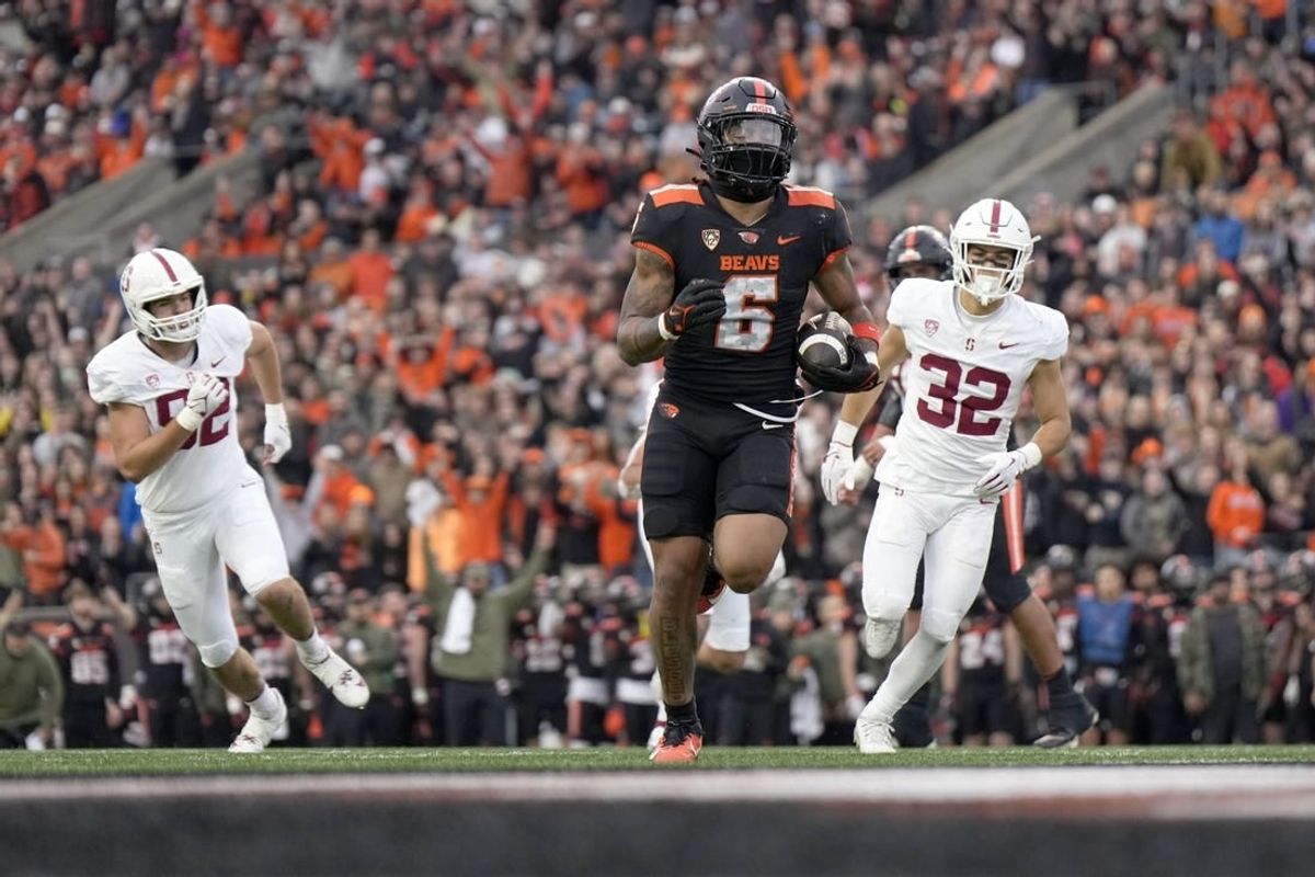 Nov 11, 2023; Corvallis, Oregon, USA; Oregon State Beavers running back Damien Martinez (6) runs with the ball for a touchdown during the first half against the Stanford Cardinal at Reser Stadium.