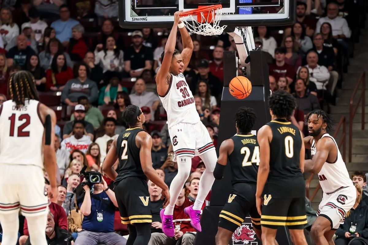 Feb 10, 2024; Columbia, South Carolina, USA; South Carolina Gamecocks forward Collin Murray-Boyles (30) dunks against the Vanderbilt Commodores in the second half at Colonial Life Arena.